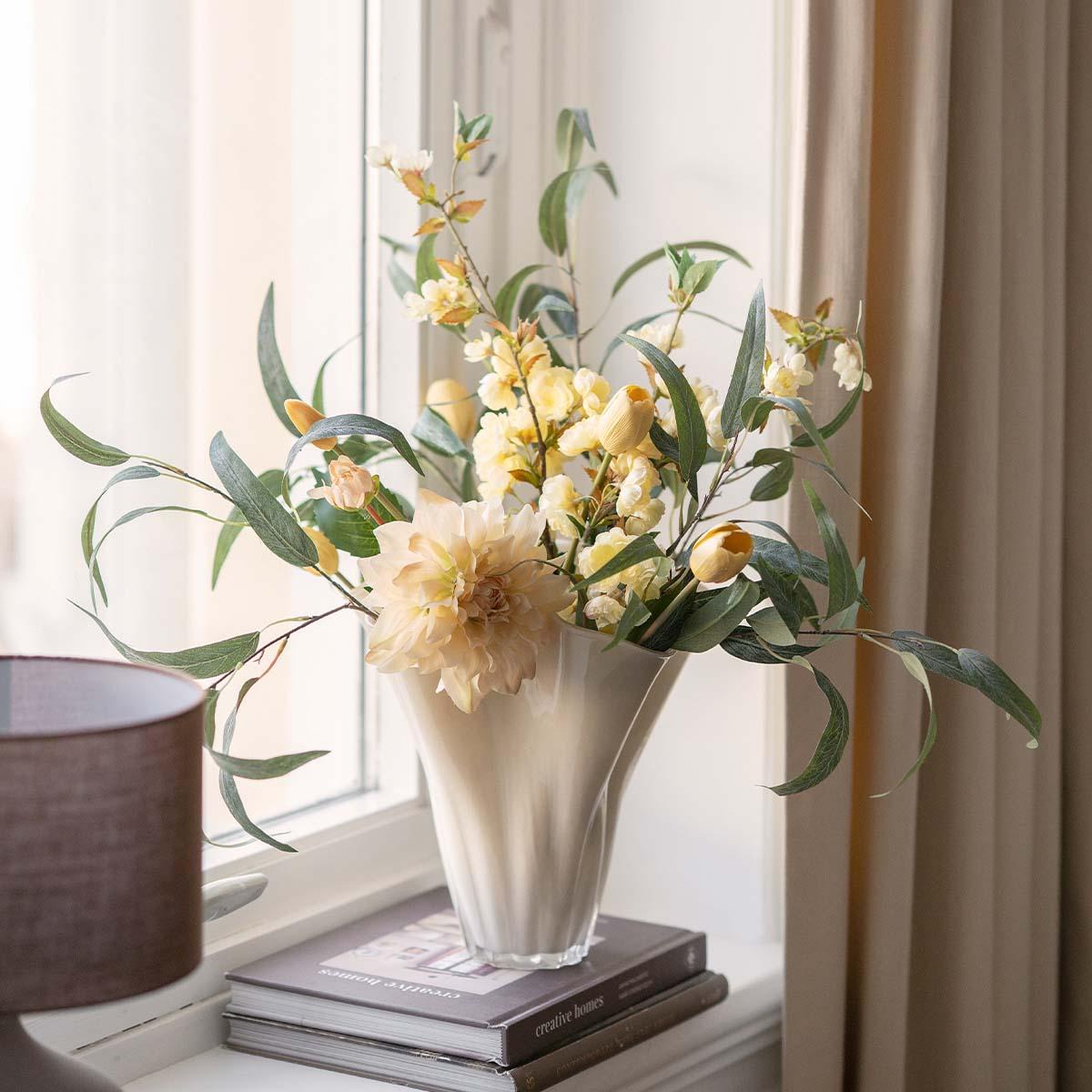 Vase med tørkede blomster