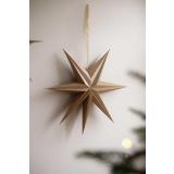 Adventsstjerne Gull hengende på vegg