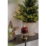 Rundt lakklys på kubbelysholder