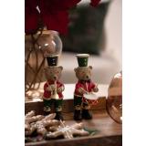 Bjørn med tromme og fløyte på lysfat med pepperkaker