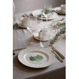 Bord dekket med duk og servise