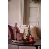 Telysholder Glitter i to størrelser står på lysfat med dekortre og lys