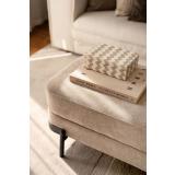 Dekorboks på puff i stue