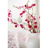 Glassegg tvist gul hengende i rosa blomstergren