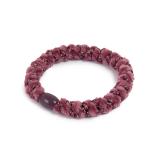 hårstrikk i plummefarge