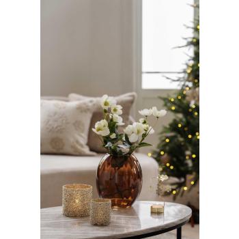 Telysholder Glitter Gull i to størrelser på bord med vase og blomster