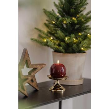 Rundt lakklys på kubbelysholder