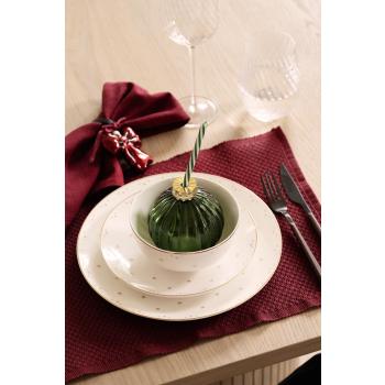 Borddekking med servise stjernehimmel, glass julekule og dekkebrikke claire