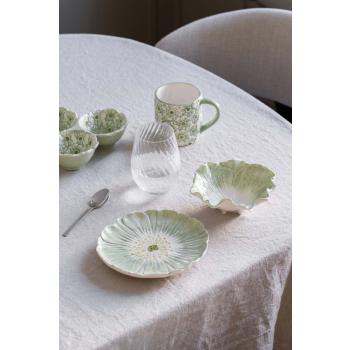 Flora servise på spisebord