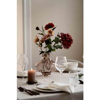 Stilkblomst julerose og krysantemum i vase ambi på spisebord