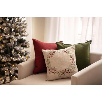 Juleputetrekk krans i sofa med andre puter