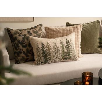 Putetrekk gullskog med broderi i sofa