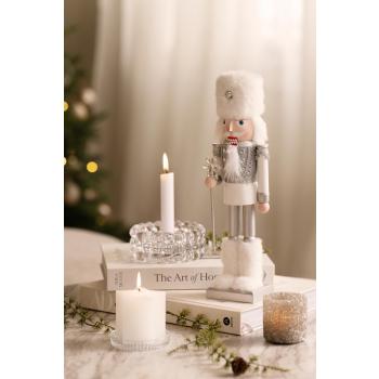 Telysholder Angel med lysholdere i klart glass og nøtteknekker på bord