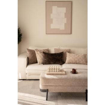 Stueinteriør i beige og brune toner