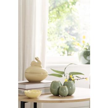 sofabord med vase, skål og påskeskål i gult