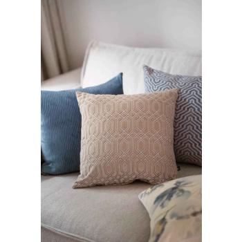 Sofakrok med puter i beige og blå farger