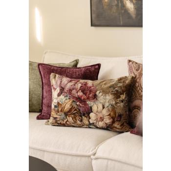 Velurpute med blomsterprint i sofakrok