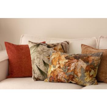 Putetrekk i oransje og brun