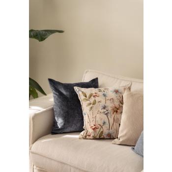 Puter i sofa i beige og blå toner