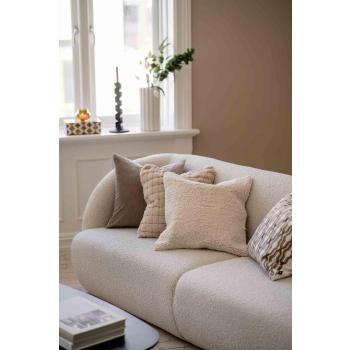 Putetrekk i sofa i fargene beige og hvit