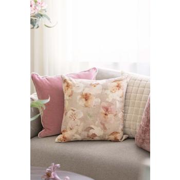 Rosa og begie puter i sofakrok