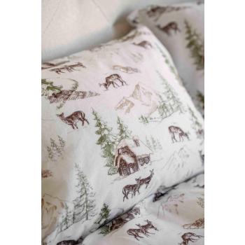 Seng med flanell sengetøy med vintermotiv nærbilde