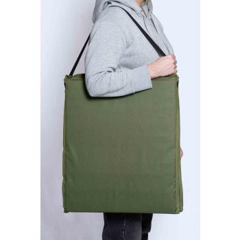 Strandmatte over skulder