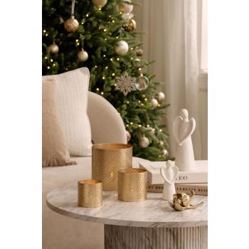 Engel, lyslykt og dekorblomst på sofabord