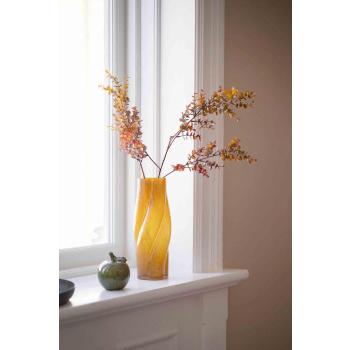 Vase Asti med stilkblomster i vinduskarmen 